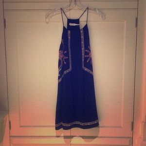 Navy dress with pink embroidery